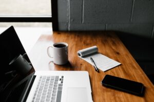 Work life balance person laptop coffee relaxed home